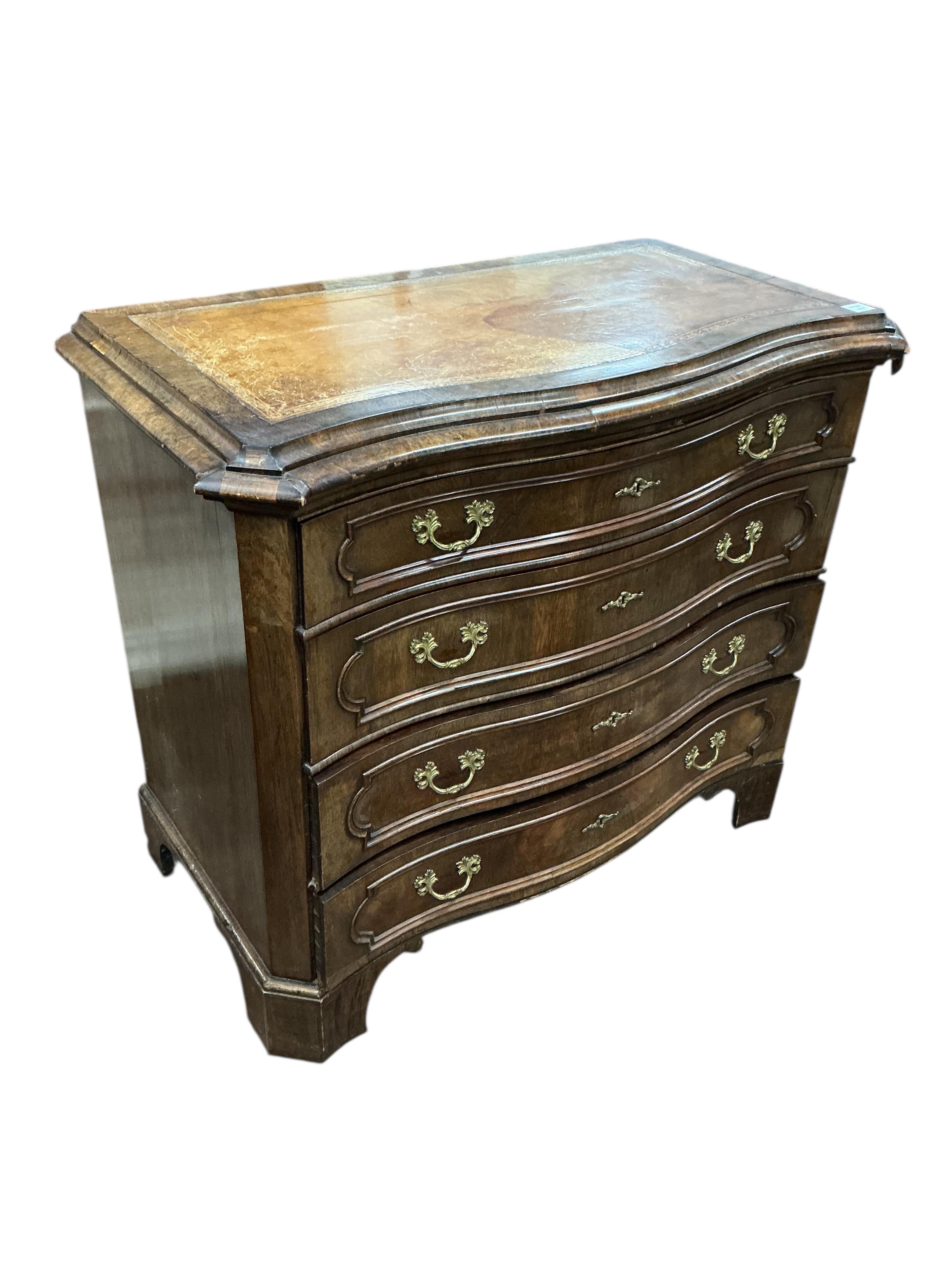 A 19th century French rosewood serpentine chest of drawers, with leather inset top, width 112cm, depth 56cm, height 95cm